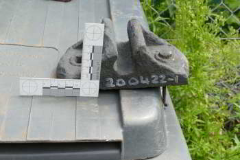 Top view of a metal rail chair on a grey background with an inset of a side view.