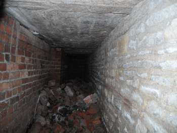 Pile of brick in undercroft