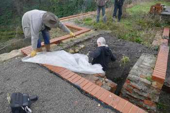 Laying a waterproof membrane on top of the New Pit heapstead